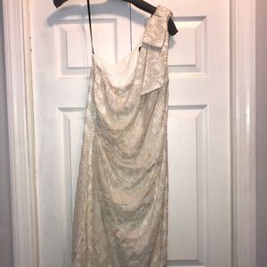 White and cream colored dress with lace detail